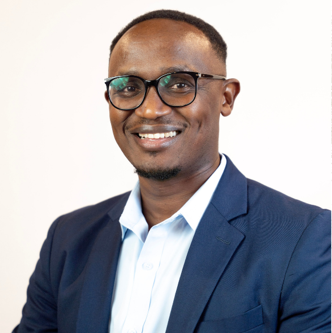 Professional headshot of Dr. Kevin Muchiri, PhD, PMP